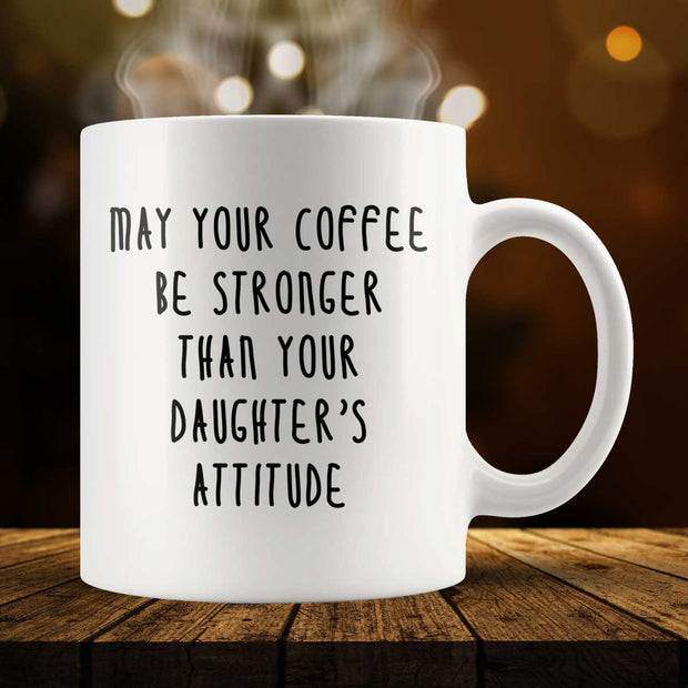 https://iconicdistrict.com/cdn/shop/products/may-your-coffee-be-stronger-than-your-daughters-attitude-mug_620x.jpg?v=1604119446